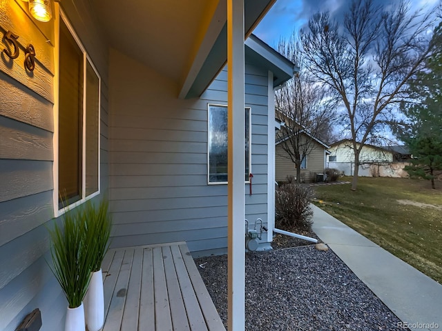 view of home's exterior with a lawn