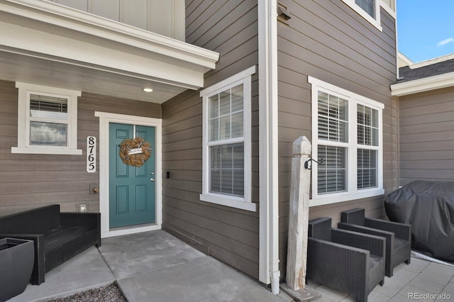 8765 Laurel Mountain Vw, Colorado Springs, CO 80924 - view of exterior entry featuring board and batten siding and a porch
