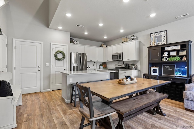 8765 Laurel Mountain Vw, Colorado Springs, CO 80924 - dining room featuring light wood finished floors and recessed lighting