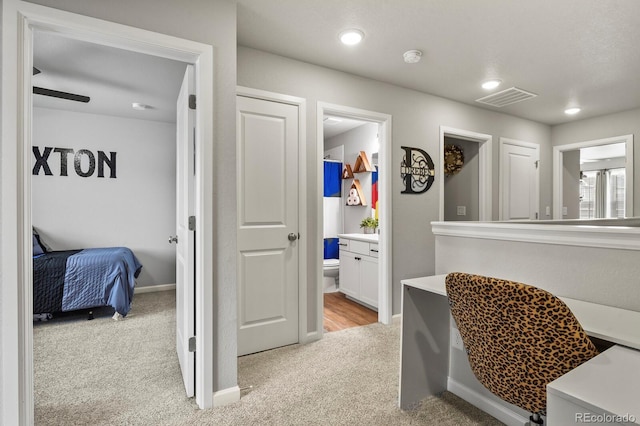 8765 Laurel Mountain Vw, Colorado Springs, CO 80924 - hall with light carpet and recessed lighting