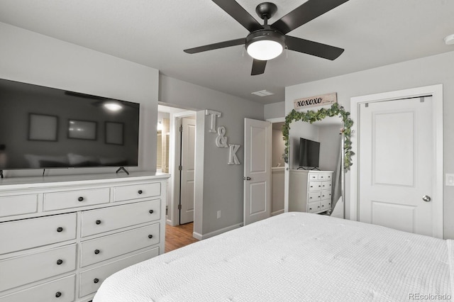 8765 Laurel Mountain Vw, Colorado Springs, CO 80924 - bedroom featuring wood finished floors and a ceiling fan