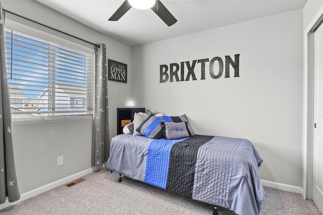 8765 Laurel Mountain Vw, Colorado Springs, CO 80924 - carpeted bedroom with baseboards and ceiling fan
