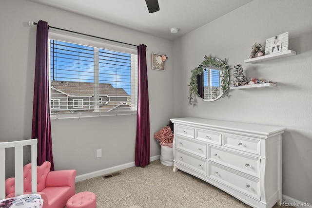 8765 Laurel Mountain Vw, Colorado Springs, CO 80924 - living area featuring light colored carpet and a ceiling fan