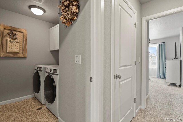 8765 Laurel Mountain Vw, Colorado Springs, CO 80924 - laundry area with washer and dryer and cabinet space