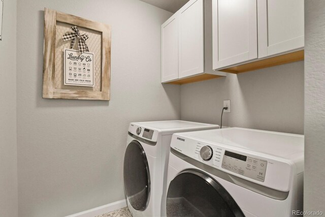 8765 Laurel Mountain Vw, Colorado Springs, CO 80924 - laundry room featuring washing machine and dryer and cabinet space