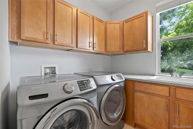 8987 E Otero Pl, Centennial, CO 80112 - laundry room with washer and dryer and cabinet space