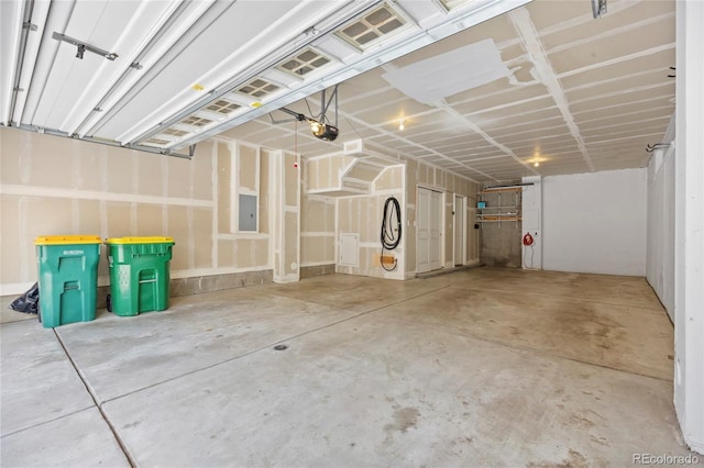 8987 E Otero Pl, Centennial, CO 80112 - garage with a garage door opener and electric panel