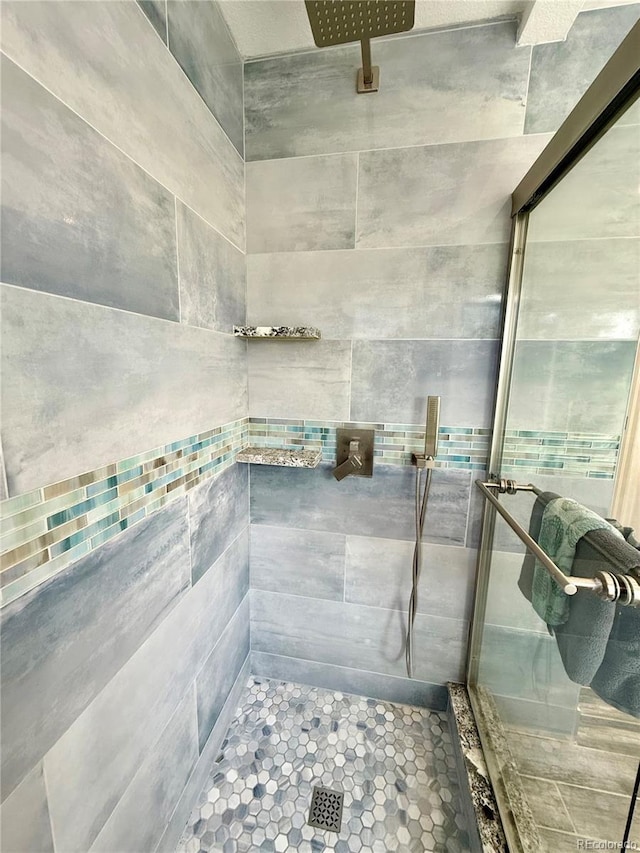 16063 E 106th Ct, Commerce City, CO 80022 - full bath featuring tiled shower