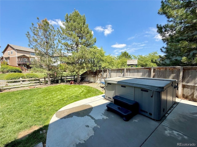 16063 E 106th Ct, Commerce City, CO 80022 - view of yard featuring a hot tub and a patio area