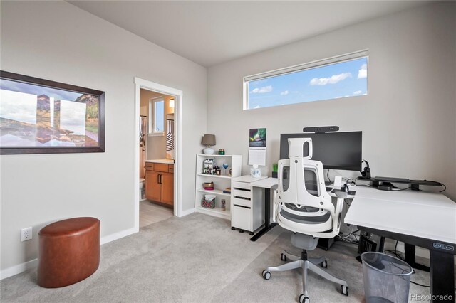 view of carpeted office space