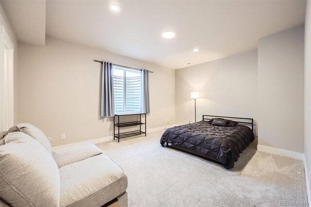 bedroom with light colored carpet