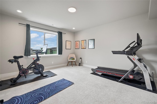 exercise area featuring carpet flooring