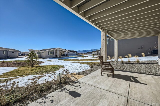 view of snow covered patio