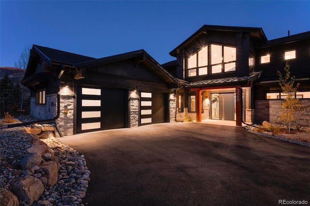 craftsman-style home with a garage