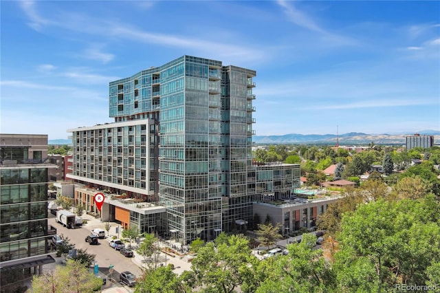 view of building exterior with a mountain view