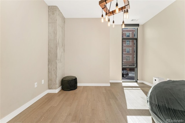 bedroom featuring light hardwood / wood-style floors