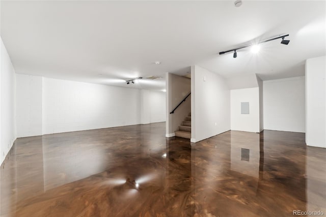 basement with rail lighting