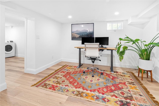 office space featuring recessed lighting, washer / clothes dryer, baseboards, and wood finished floors