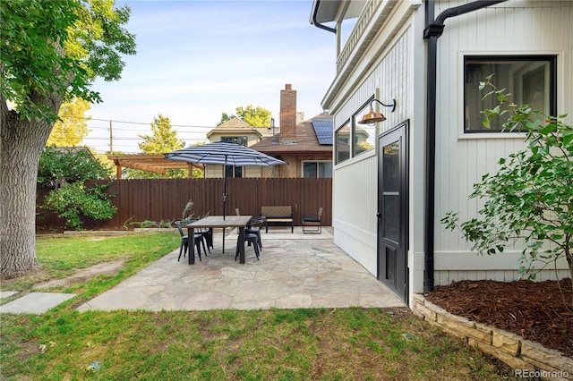 view of patio / terrace with fence