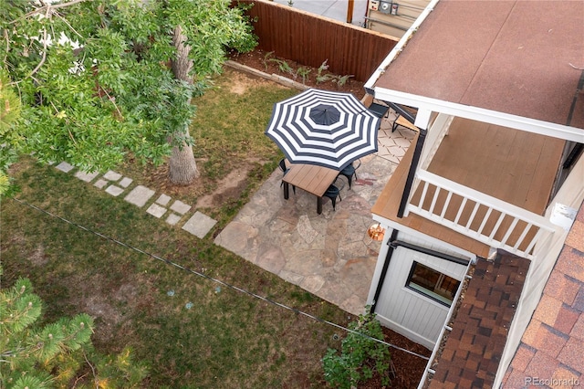 view of patio / terrace featuring fence