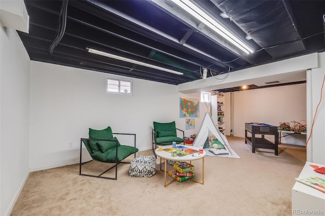 playroom featuring carpet flooring and baseboards