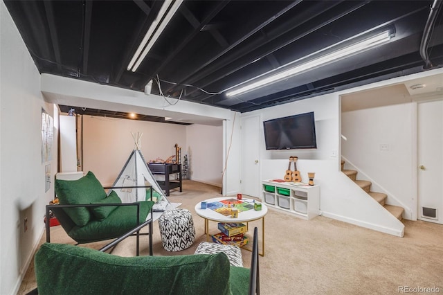 finished basement with carpet and stairway