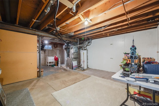 basement with water heater and heating unit