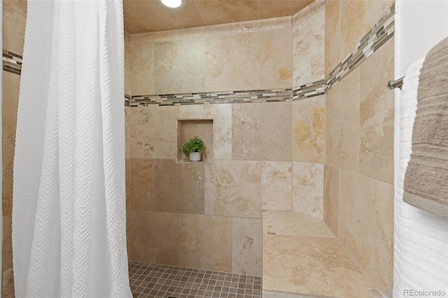 bathroom with curtained shower