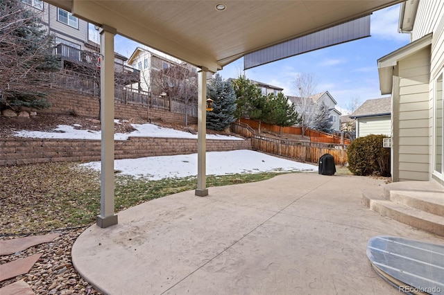 view of snow covered patio