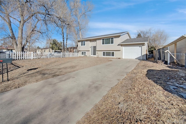 split foyer home featuring a garage