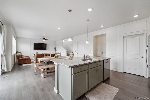 2201 Monte Vista St, Fort Lupton, CO 80621 - kitchen with appliances with stainless steel finishes, a sink, a decorative wall, gray cabinets, and a ceiling fan