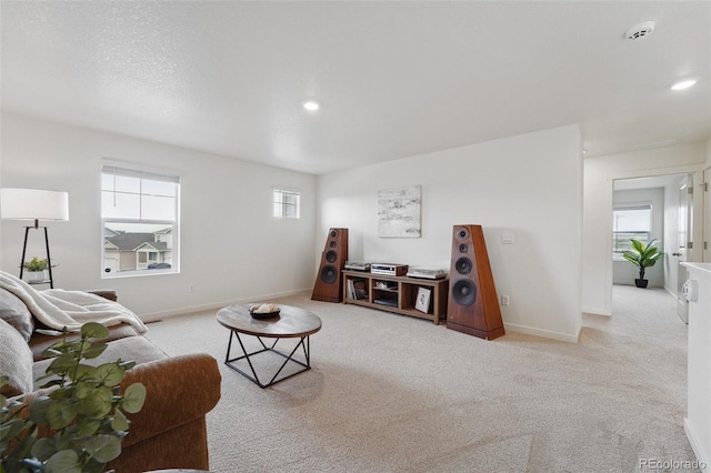 2201 Monte Vista St, Fort Lupton, CO 80621 - living room featuring baseboards, recessed lighting, and carpet