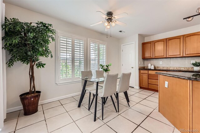 5957 Turnstone Pl, Castle Rock, CO 80104 - dining space with a ceiling fan, baseboards, and light tile patterned floors