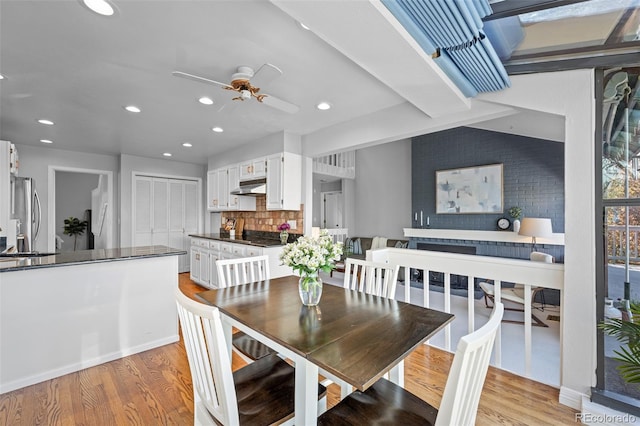 dining space with light wood-style floors, recessed lighting, and ceiling fan
