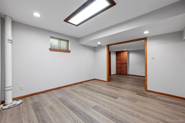 interior space featuring recessed lighting, baseboards, and light wood-style flooring
