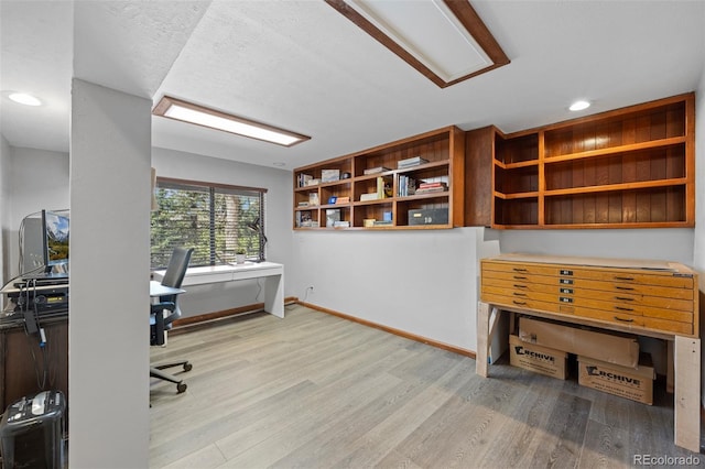 office space with recessed lighting, baseboards, and wood finished floors