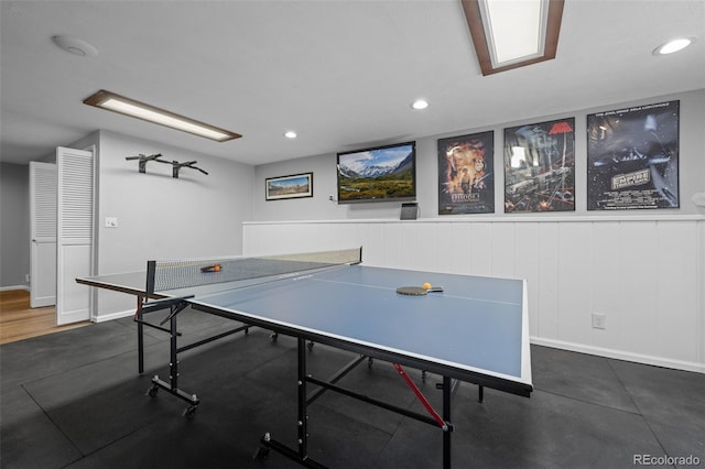rec room with recessed lighting and baseboards