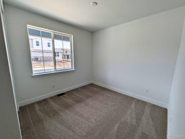 8326 Cokedale Cir, Littleton, CO 80125 - empty room with carpet floors and baseboards