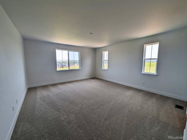 8326 Cokedale Cir, Littleton, CO 80125 - spare room with carpet flooring and baseboards