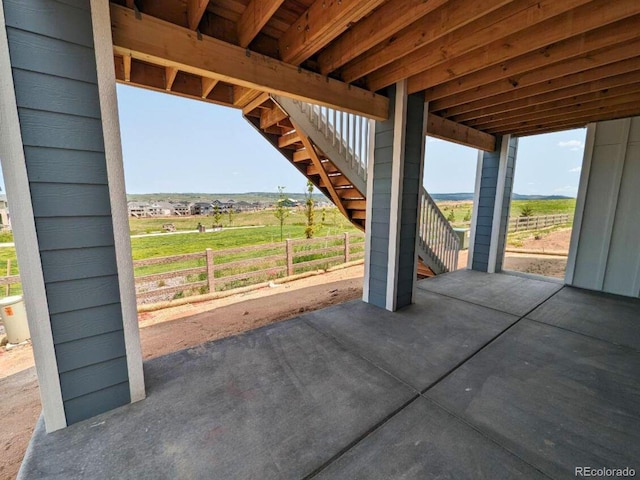 8326 Cokedale Cir, Littleton, CO 80125 - view of patio / terrace featuring stairs and a rural view