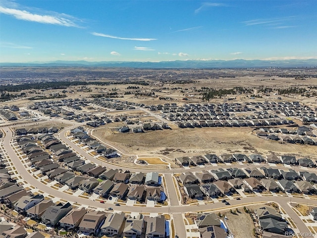 drone / aerial view with a mountain view and a residential view