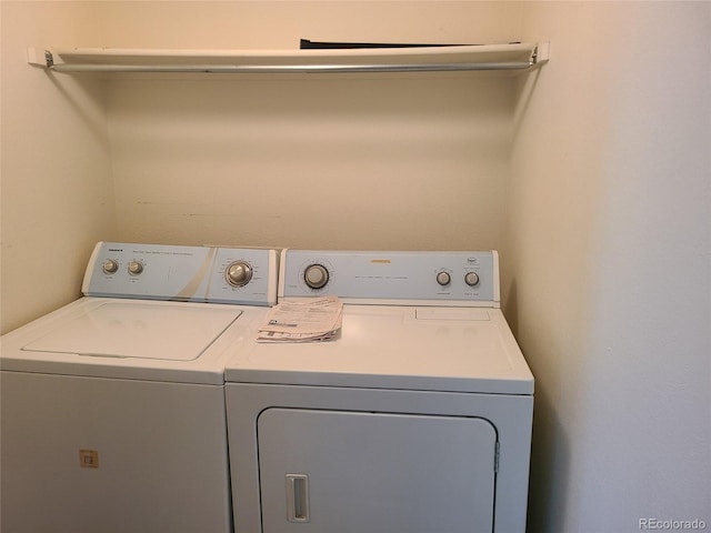 4760 S Wadsworth Unit 301, Littleton, CO 80123 - laundry area featuring separate washer and dryer