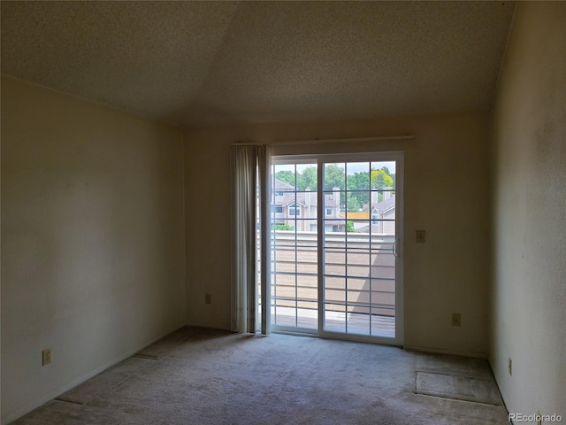 4760 S Wadsworth Unit 301, Littleton, CO 80123 - unfurnished room featuring carpet and a textured ceiling