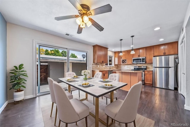 3806 S Yosemite St, Denver, CO 80237 - dining space with recessed lighting, dark wood-style floors, ceiling fan, and baseboards