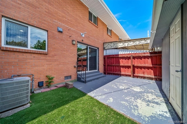 3806 S Yosemite St, Denver, CO 80237 - view of patio / terrace featuring central AC unit and entry steps