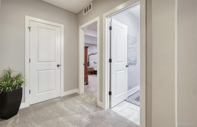 15804 Elizabeth Cir E, Thornton, CO 80602 - hall with carpet and baseboards