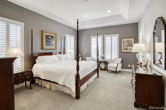 15804 Elizabeth Cir E, Thornton, CO 80602 - bedroom featuring a tray ceiling, carpet, baseboards, and recessed lighting