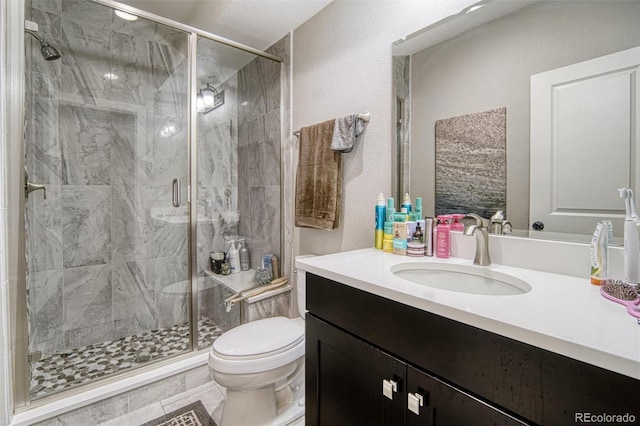 15804 Elizabeth Cir E, Thornton, CO 80602 - full bath featuring toilet, vanity, and a stall shower