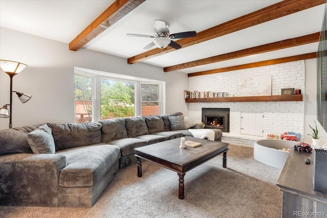 10833 W 61st Ave, Arvada, CO 80004 - carpeted living room with beam ceiling, a ceiling fan, and a brick fireplace