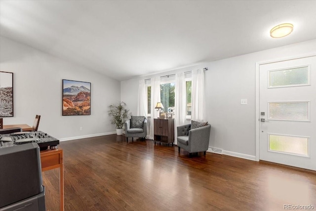 10833 W 61st Ave, Arvada, CO 80004 - interior space with wood finished floors and vaulted ceiling